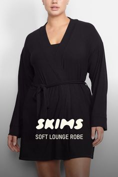 Perfect for lounging and layering over sleepwear, the Soft Lounge Robe is composed of super-soft modal ribbed fabric that drapes effortlessly in all the right places. This short robe features an adjustable self-tie belt and functional side pocket at inseam. | SKIMS Robe | Black | XS | Soft Lounge V-neck Robe With Tie Waist For Loungewear, Wrap Sleepwear With Tie Waist For Loungewear, Tie Waist Wrap Sleepwear For Loungewear, Tie Waist Wrap Sleepwear, Long Sleeve Robe With Tie Waist For Lounging, Spring Lounging Wrap Sleepwear, Long Sleeve Tie Waist Sleepwear For Lounging, Long Sleeve Sleepwear With Tie Waist For Lounging, Relaxed Fit Robe For Lounging