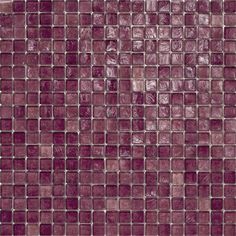 a close up view of a purple glass mosaic tile