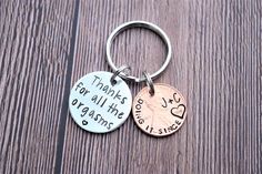 two key chains with words on them that say, thanks for all the organics