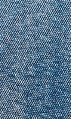 a close up view of the blue and white fabric