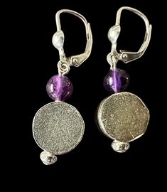 Dangling elegantly from a 3/4 inch length, round and flat Thai silver beads are beautifully accented with a polished amethyst bead Henderson Nv, Amethyst Beads, Silver Beads, Jewelry Earrings Dangle, 4 Inch, Dangle Drop Earrings, Dangle Earrings, Amethyst, Jewelry Earrings