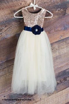 This dress is just beautiful! It is a beautiful shade of cream tulle on the bottom. The rose gold sequin top add a fun, elegant feel while the full tulle bottom is a little girls dream! Super comfortable and perfect for your next special event. IDEAL WEAR: Flower Girl Dress Cake Smash First Rose Gold Flower Girl Dress, Cream Flower Girl Dress, Gold Flower Girl Dress, Rose Gold Sequin Top, Wedding Gown Princess, Gold Flower Girl, Bohemian Birthday, Sequin Flower Girl Dress, Gold Sequin Top