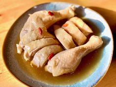 a plate with dumplings on it sitting on a table