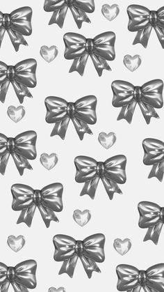 silver bows and hearts on a white background