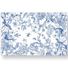 a blue and white floral pattern with birds