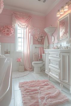 a bathroom decorated in pink and white