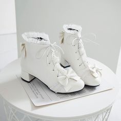 Fashion Lolita Bowtie Boots PN3713 ●Size:please see the picture. ●Heel Hight:about 3.5 cm ●Material:PU (Please allow 1-3cm differs due to manual measurement.As different computers display colors differently,the color of the actual may vary slightly from the above images.Thanks for your understanding.) ●About Shipping: We attach great importance to the orders of each customer and parcel delivery. 1.Processing time: 2-3 business days. 2.Shipping time: 10-15 business days to US, please allow 3-4 weeks shipping to other country.(Shipping times can be affected by variable customs clearance times or public holidays.) White Lace-up Boots With Round Toe For Party, Cute White Boots For Fall, White Laced Boots For Spring, Spring White Lace-up Boots With Flat Heel, White Flat Heel Lace-up Boots For Spring, Fitted White Lace-up Boots, Cute White Lace-up Boots, Cute White Closed Toe Boots, White Lace-up Boots