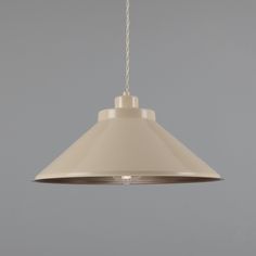 a white light hanging from a ceiling with a chain attached to the bottom of it