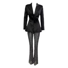 Upgrade your party look with our Moira set. This two-piece set includes a 3D flower decor backless satin blazer and faux pearl embroidered mesh pants. Perfect for any special event, this set will elevate your style with its unique design. Feel confident and stylish in our Moira set. Fabric: Non-Stretch Material: Polyester Fiber Fitted Pantsuit For Formal Party Season, Fitted Formal Pantsuit For Party Season, Fitted Party Sets, Fitted Party Sets For Party Season, Glamorous Silk Sets For Formal Occasions, Spring Embellished Fitted Sets, Chic Embellished Formal Sets, Elegant Satin Bottoms For Party, Elegant Embellished Pants For Spring