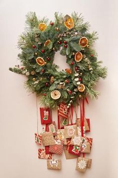 a christmas wreath is hanging on the wall