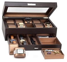 an open watch box with many watches in it