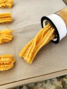 some kind of food that is being made on a pan and placed on a counter