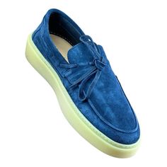 Elevate your style with these Bata moccasins for men. Crafted with genuine leather, these slipper shoes feature a solid blue color and a suede lining. The shoes come in size 42, which is equivalent to US size 8.5-9 and UK size 8. These moccasins are perfect for casual occasions, and the camoscio model adds a touch of sophistication to your outfit. The shoes are made in Italy, ensuring high-quality materials and attention to detail.The outsole and upper material are both made of suede, while the Blue Slip-on Moccasins, Blue Loafers With Contrast Sole Slip-on, Blue Suede Tassel Loafers With Round Toe, Blue Slip-on Loafers With Rubber Sole, Blue Suede Slip-on Tassel Loafers, Blue Slip-on Loafers With Contrast Sole, Blue Leather Slip-on Shoes With Suede Lining, Blue Moc Toe Leather Shoes With Rubber Sole, Blue Suede Moccasins With Plain Toe