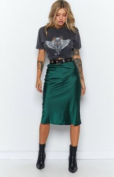 Trisha Midi Skirt Emerald – Beginning Boutique Trendy Long Green Skirt, Trendy Green Long Skirt, Trendy Lined Midi Skirt, Trendy Relaxed Fit Midi Skirt, Casual Relaxed Skirt For Party, Trendy Green Knee-length Skirt, Green Knee-length Skirt For Night Out, Casual Midi Skirt For Party, Casual Midi Skirt For Night Out