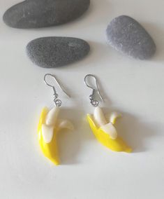 Banana earrings Fun and adorable half-peeled banana pop earrings! Composition resin banana pendants stainless steel ear hooks Jewel sent by registered letter Fruit Jewellery, Banana Earrings, Peeled Banana, Crystal Confetti, Fun Fruit, Funny Kawaii, Kawaii Fruit, Fruit Jewelry, Fruit Earrings