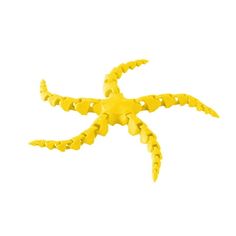 a yellow plastic crab on a white background