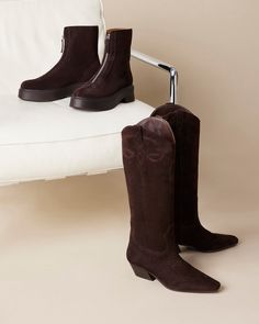 The DOLLIE Western boot offers a sleek and stylish design with a square toe. Experience comfort and durability with every step. Elevate your wardrobe with this timeless and versatile statement piece. 1.75 inch heel height Size 6 measurements: 15 inch shaft circumference, 13 inch shaft height Size 8 measurements: 16 inch shaft circumference, 14 inch shaft height Size 10 measurements: 17 inch shaft circumference, 14.75 inch shaft height Suede upper material Textile and synthetic lining Synthetic s Square Toe Boots Women, Brown Square Toe Boots, Suede Western Boots, Western Boots Women, Square Toe Boots, Western Boot, 2 Inch Heels, Zipper Detail, Womens Boots Ankle