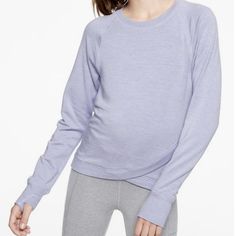 Athleta Girl Violet Blue Long Sleeve Criss Cross My Heart Sweatshirt Brand New - Without Hang Tag, The Label Inside Is Partially Covered To Prevent Return To The Retail Stores. Material - 65% Polyester 35% Viscose Purple Sportswear Top For Workout, Purple Crew Neck Gym Activewear, Purple Athleisure Tops For Sports, Purple Stretch Sportswear Tops, Purple Crew Neck Athleisure Activewear, Purple Sportswear Sweatshirt For Sports, Purple Sporty Yoga Tops, Sporty Purple Yoga Tops, Blue Crew Neck Top For Light Exercise