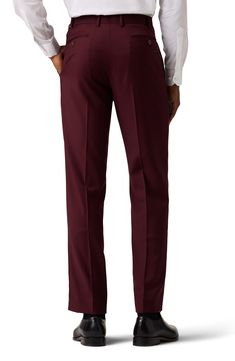 Dress to impress in these polished and practical trousers tailored from wrinkle-resistant performance fabric. 32" inseam; 15.75" leg opening; 10.125" rise (size 32x32) Zip fly with hook-and-bar closure Jetted pockets Lined Polyester/rayon blend with 2% spandex
 Dry clean Imported Fitted Flat Front Pants With Pockets, Fitted Business Bottoms With Pockets, Solid Color Dress Pants With Welt Pockets, Solid Dress Pants With Welt Pockets And Flat Front, Fitted Solid Color Dress Pants For Semi-formal Occasions, Solid Flat Front Pants With Welt Pockets, Fitted Work Pants With Belt Loops, Solid Color Flat Front Pants With Welt Pockets, Fitted Straight Leg Dress Pants With Pockets