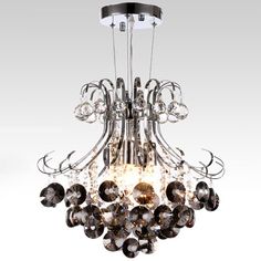 a chandelier with many crystal balls hanging from it