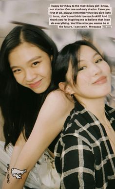 two women are posing for the camera with one woman's arm around her shoulder