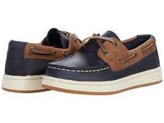 Sperry Kids Sperry Cup II Boat (Little Kid/Big Kid) - Boy's Shoes : Navy/Tan : Rock the Sperry Kids Sperry Cup II Boat shoes with just about any casual ensemble for a handsome look. Leather upper made with genuine hand-sewn Tru-Moc construction for durable comfort. 360° Lacing System with genuine raw hide laces and rustproof eyelets for a secure fit. Textile lining and insole. Memory foam footbed. Non-marking rubber outsole designed for great traction on wet surfaces. Imported. Measurements: Wei Casual Boat Shoes With Textured Sole, Casual Leather Boat Shoes With Rubber Sole, Casual Leather Low-top Boat Shoes, Casual Boat Shoes With Plain Toe, Casual Leather Boat Shoes With Textured Sole, Navy Casual Sneakers With Stitched Sole, Casual Brown Low-top Boat Shoes, Casual Boat Shoes With Rubber Sole And Moc Toe, Casual Boat Shoes With Rubber Sole