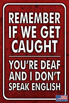 a red sign that says, you're dead and i don't speak english