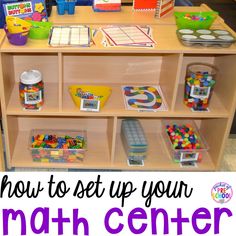 a wooden table topped with lots of toys and books next to a sign that says how to set up your math center