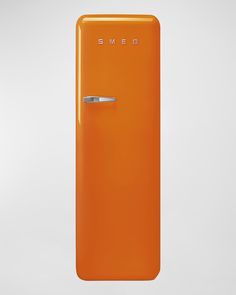 an orange refrigerator with the door ajar and some metal handle on it's left side