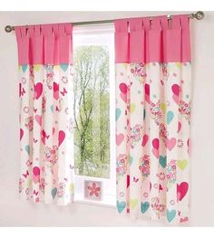 a window with pink curtains and hearts on the curtain valance, in front of a white wall