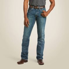 Ruggedly handsome and supremely comfortable, these jeans are ready for wherever the day (or night) takes you. Our straight leg M5 is fitted through the hip and thigh for a modern yet classic look. M5 Slim Boundary Stackable Straight Leg Jean | Men's M5 Slim Boundary Stackable Straight Leg Jeans in Gulch, Size: 44 X 30 by Ariat Rugged Fitted Washed Jeans, Rugged Fitted Denim Jeans, Fitted Rugged Jeans In Medium Wash, Western Style Medium Wash Cotton Jeans, Western Style Cotton Jeans In Medium Wash, Classic Medium Wash Jeans For Rodeo, Rugged Medium Wash Jeans For Rodeo, Rugged Fitted Jeans For Rodeo, Straight Leg Jeans Men