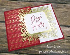 a red and gold christmas card with the words deck the tables written on it's side