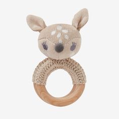 a wooden ring with a knitted deer head on it's face and ears