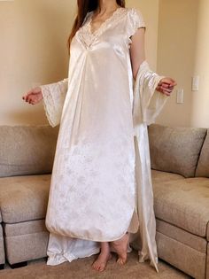 Christian Dior Long Ivory Nightgown and Robe Set/Size M/Sexy/Lacy/ Negligee/Dressing Gown/Lingerie Set/Bridal/Wedding/Gift Set Pristine Condition. Very rare to find a set from the 1959 Year with the Nightgown and Robe with matching belt in this excellent like new condition. You could give this as a Bridal Gift for the Wedding Night or as part of the Honeymoon Trousseau. Model is a size Medium and is 6 Feet Tall. This set would easily fit a large also. As always, shipping is free in the US on ord Floor-length Lace Trim Nightgown For Wedding, Floor-length Wedding Nightgown With Lace Trim, White Lace Nightgown For Wedding, White Lace Wedding Nightgown, Cream Lace Wedding Nightgown, Floor-length White Nightgown For Wedding Night, Wedding Cream Lace Nightgown, White Floor-length Nightgown For Wedding Night, Floor-length Sleepwear For Wedding Night