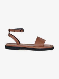 Editor's NoteNeute designs shoes with the natural luxury of leather.- Classic and daily sandals- Sophisticated stitch line detail- Comfortable and stable fit with buckle strap- Soft and smooth goat skin used Measurements (in.)- Size: KR 220MM - KR 260MM (35 - 39)- Heel Height: 0.98 in. Composition & Care- Upper: Goat Skin, Lining: Pig Skin, Sole: Suede Sole- All products are hand-made, so sewing and finishing may not be uniform, and double stitching, fine pen marks, and removable b Brown Slingback Sandals With Ankle Strap And Leather Sole, Brown Ankle Strap T-strap Sandals With Leather Footbed, Brown Slingback Sandals With Buckle Closure, Brown T-strap Sandals With Ankle Strap, Leather Sandals With Penny Strap, Classic Closed Toe Sandals With Penny Strap, Ankle Strap Sandals With Calf Leather And Leather Lining, Modern Brown Sandals With Buckle Closure, Brown Slingback Sandals With Ankle Strap And Buckle