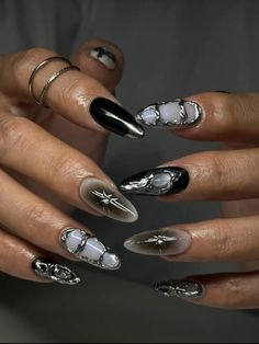 Don Toliver Aesthetic Nails, Tiktok Nail Trend, Silver Alien Nails, Black Nails Gothic Design, Gel Nails Gothic, Sigil Nail Art, Black Almond Acrylic Nails Design, Almond Black Nails Ideas, Black And Grey Nail Art