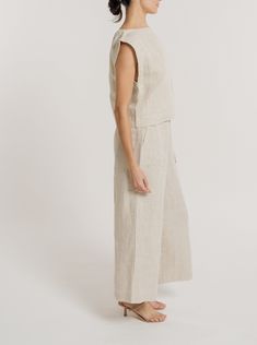 Our iconic Everyday Top is handcrafted from luxurious certified organic linen in natural linen. This easy, minimalist top features a wide neckline, slightly boxy body, and mid-to-cropped length, perfect for tucking into our Everyday Crop Pant or wearing with your favorite jeans. We appreciate the natural beauty of linen's undyed color and are excited to highlight it this season in our a Natural colorway. Made with Organic LinenLined with Organic CottonHandmade in IndiaMachine wash cold on delica Minimalist Top, Organic Linens, Natural Linen, Favorite Jeans, Cropped Pants, Natural Beauty, Organic Cotton, How To Wear, Beauty