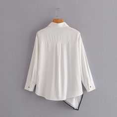 White Long Sleeve Patchwork Top, White Patchwork Blouse For Fall, Chic White Tops With Patchwork, Fall Long Sleeve Blouse With Splicing, Chic White Patchwork Tops, Fall Long Sleeve Splicing Blouse, Long Sleeve Blouse With Splicing For Fall, Long Sleeve Blouse With Splicing For Summer, Long Sleeve Spliced Blouse For Summer