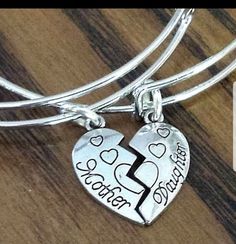 "New Engraved Mother & Daughter Half Heart Charm Silver Plated Adjustable Bangle Bracelet Set ~Includes two bracelets & charms as shown ~Silver plated, engraved Mother & Daughter half heart charm ~Silver plated wire bangle fits wrists 5.5\" to 8.5\" in diameter ~Each half heart charm measure 1\" long x 1/2\" wide Ships within 24 hours of purchase Monday-Saturday" Mom Daughter Jewelry, Mother Daughter Bracelet Set, Silver Chain Anklet, Daughter Bracelet, Half Heart, Mother Daughter Bracelets, Mom Daughter Gifts, Christmas Gift Daughter, Graduation Gifts For Daughter