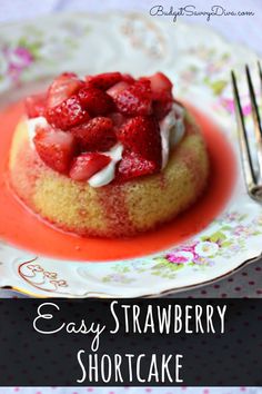 a strawberry shortcake on a plate with a fork