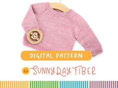 a pink sweater with a wooden button on it and the words digital pattern sunny day free