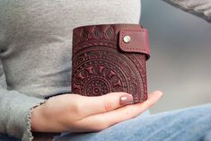 Small Wallet with Sun Pattern, Designer Wallets, Women Wallets, Leather Wallets, Handmade Leather Wallets Embossed Looking to upgrade your wallet game? Look no further! Introducing our all-new leather wallet that combines elegance and practicality in one stunning accessory. Here are the key features of our product: ✔️ Functions: High-quality genuine leather: Our wallet is crafted from the finest goat leather, showcasing its natural beauty and durability. Author's ornament: The wallet features a unique design pattern, adding a touch of individuality to your style. Functionality and durability: With multiple compartments and a secure closure, our wallet offers practicality and long-lasting performance. Compact size: Measuring 3.8 inches x 4.3 inches, it's designed to be slim and compact, eas Luxury Women's Wallets With Leather Lining, Luxury Leather Elegant Wallets, Luxury Elegant Embossed Wallets, Luxury Textured Leather Elegant Wallet, Luxury Elegant Leather Wallets, Luxury Embossed Elegant Wallets, Luxury Elegant Textured Leather Wallet, Luxury Handmade Wallets For Daily Use, Luxury Artisan Wallets For Everyday Use