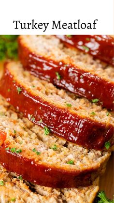 sliced meatloaf with ketchup on top and parsley in the middle