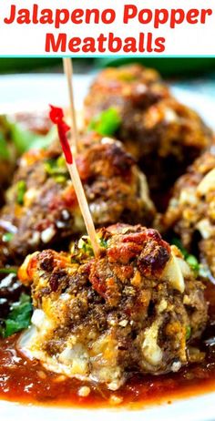 meatballs with sauce and toothpicks are on a white plate, ready to be eaten