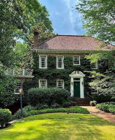 a house with ivy growing on it's side