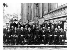 an old black and white photo of men in suits