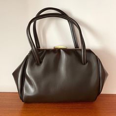 Description: Vintage Soft Brown Kelly Handbag. Gold Hardware.  Measurementsstrong>Width: 33cm, Height: 21cm, Strap to Bag: 15cm Kelly Handbag, Vintage Kelly, Top Handle Bags, Gold Handbags, Vintage Soft, Soft Brown, Brown Bags, Cute Bags, Gold Hardware