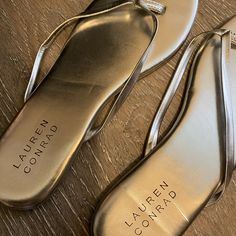 Beautiful Silver Sandals From Lauren Conrad Never Worn Spring Synthetic Gold Flip Flops, Spring Gold Synthetic Flip Flops, Gold Cushioned Flip Flops For Spring, Gold Flat Sandals, Silver Sandals, Flip Flop Shoes, Lc Lauren Conrad, Lauren Conrad, Flip Flop