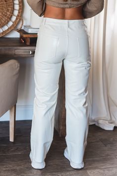 Shimmer in the Brooklyn Pants! These a great twist on a classic white faux leather pants Patent shimmer faux leather pants 55% Polyurethane 45% Viscose Rayon Fitted leather pants Front pockets Button closure No elastic or stretch Belt loops Runs small - Model sized up! Model is wearing a size Medium. She is 5'6". 135lbs. Bust: 34C Waist 26" Hips 36" White Leather Pants Women, Fitted Leather Pants, White Leather Pants, Leather Pants Women, Stretch Belt, Viscose Rayon, Pants Large, Faux Leather Pants, Pet Hair