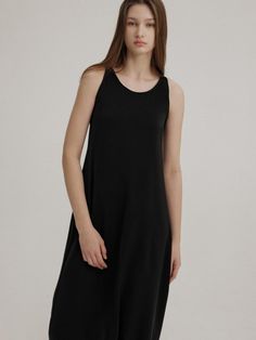 This is a trendy and minimal dress by AVA MOLLI that is made out of high quality and sturdy material. With distinctive mood of the design and feminine look, you can style it for your trendy and refined daily outfit.- Color point on the neckline and armhole- High density fabric with subtle gloss- Classic look that goes with various styling Sleek Black A-line Sleeveless Dress, Black Sleek Sleeveless Midi Dress, Sleek Black Sleeveless Midi Dress, Sleek Black Knee-length Sleeveless Dress, Black Stretch Viscose Dress, Modern Black Maxi Dress For Work, Sleek Black Maxi Dress With Flattering Silhouette, Classic Black Sleeveless Dress For Summer, Classic Black Sleeveless Summer Dress